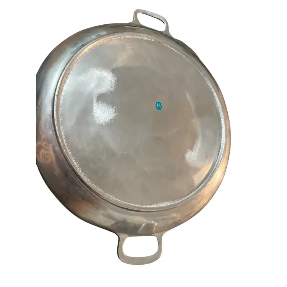 Hammered Aluminum Serving Tray from Mexico .Twelve inches diameter.